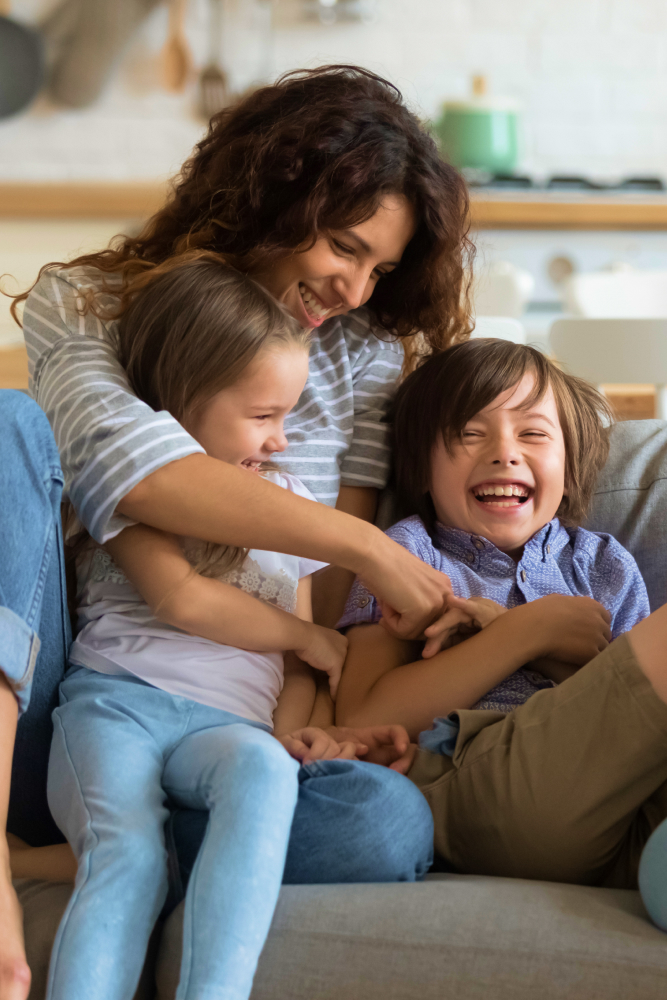 mom with son and daughter at home